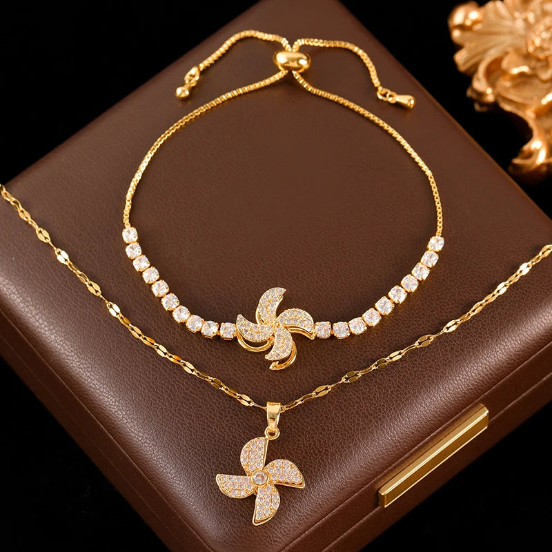 Stainless Steel Rotating Clover Zircon Necklace Bracelet Set