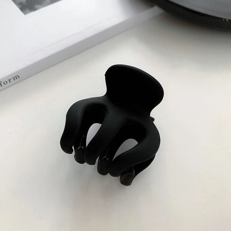 Elegant Black Geometric Plastic Hair Claw